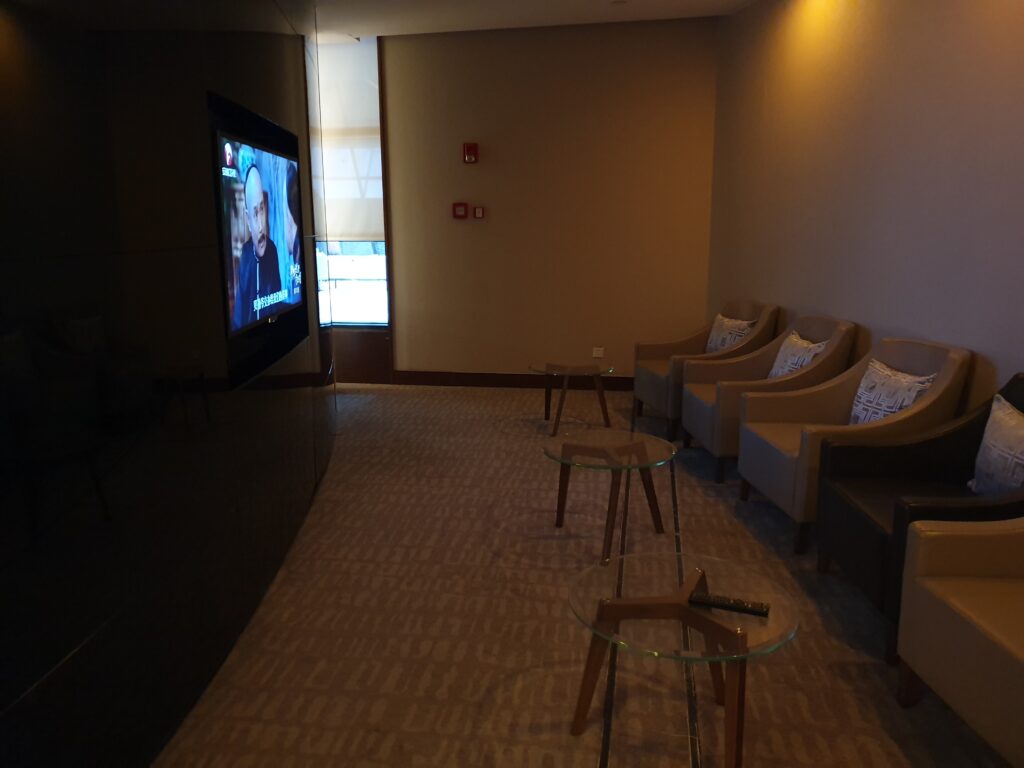 Air China First Class Lounge TV Area