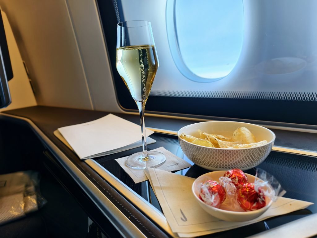BA 777 First Class To New York JFK Take off Champagne & Nibbles