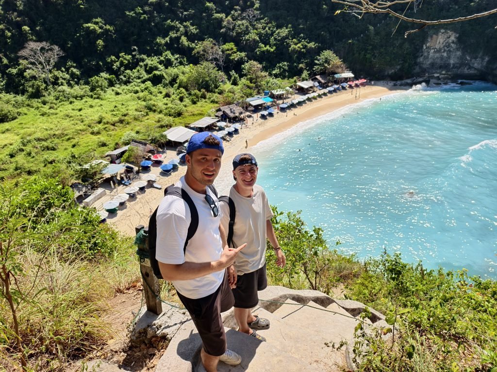 Hiking Down Steep Path to Atuh Beach
